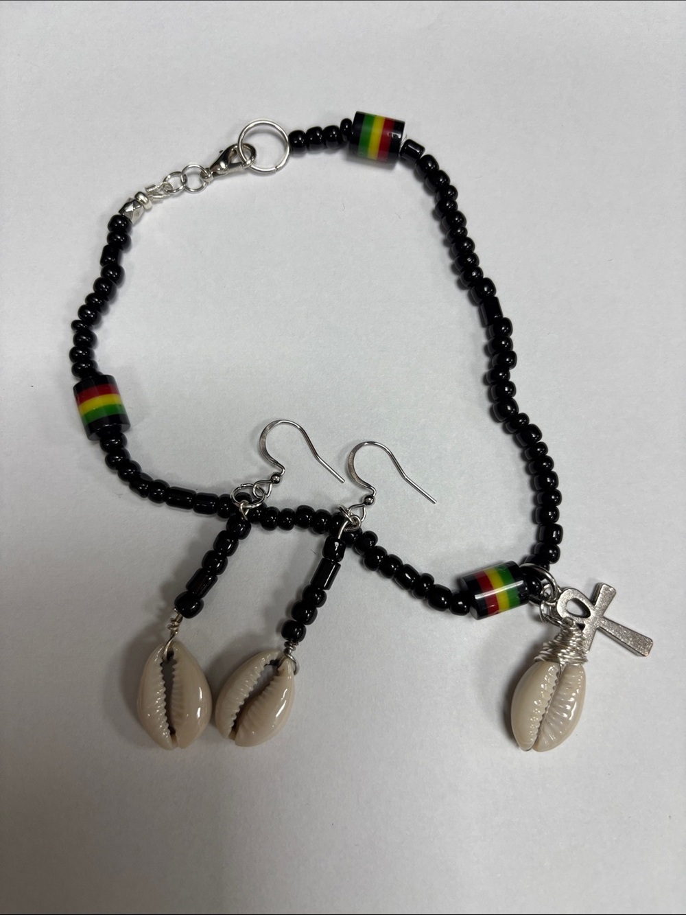 Black Beaded Cowrie Drop Earrings with Rasta Accent